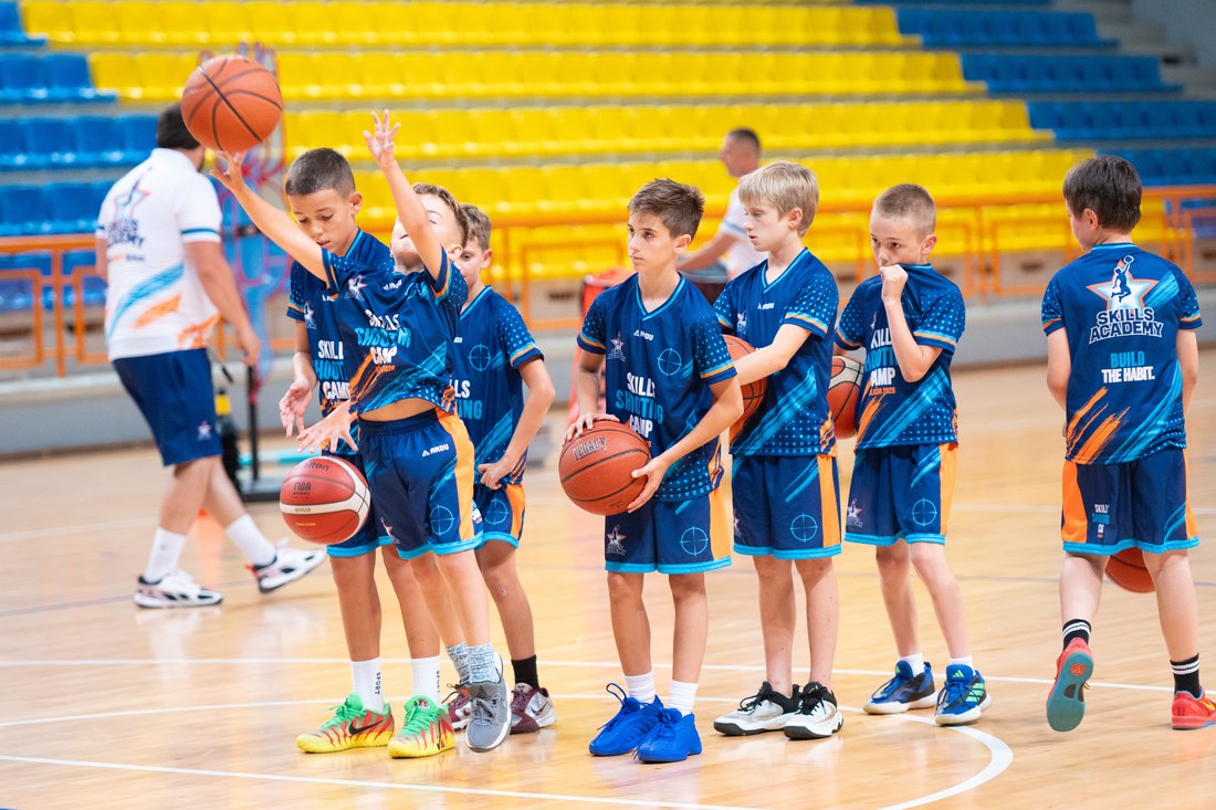 Coach correcting a player’s form at Skills Academy