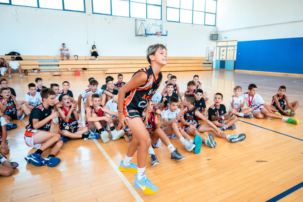 Relay race start — the whole camp watching
