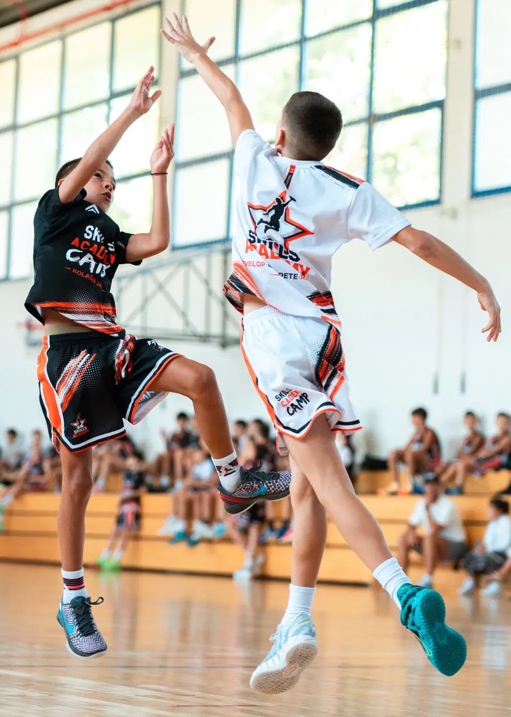 Finishing over a defender at the rim
